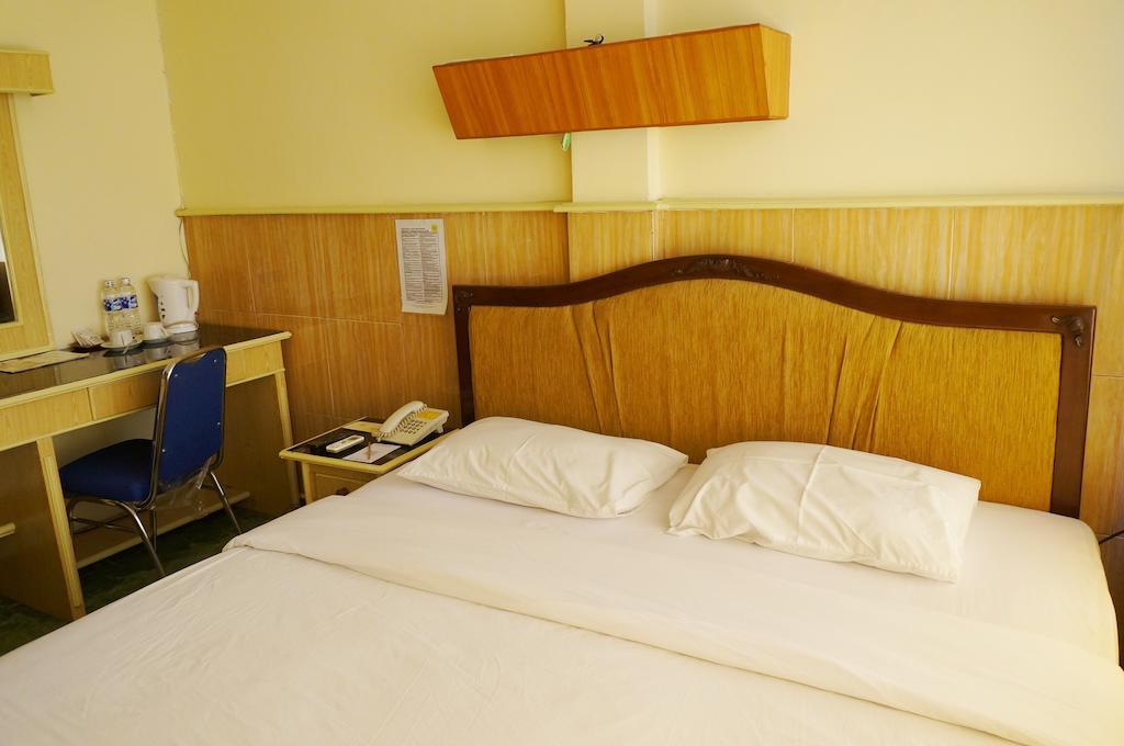 Hotel Duta Palimbão Quarto foto
